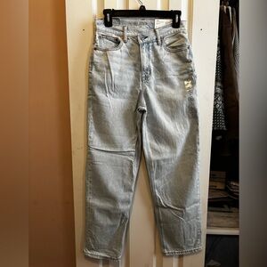 Highest waist baggy straight jeans. Light blue.